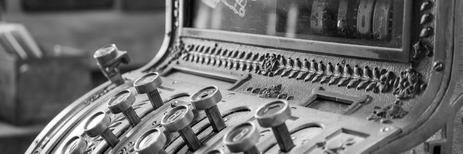 grayscale photo of round metal tool