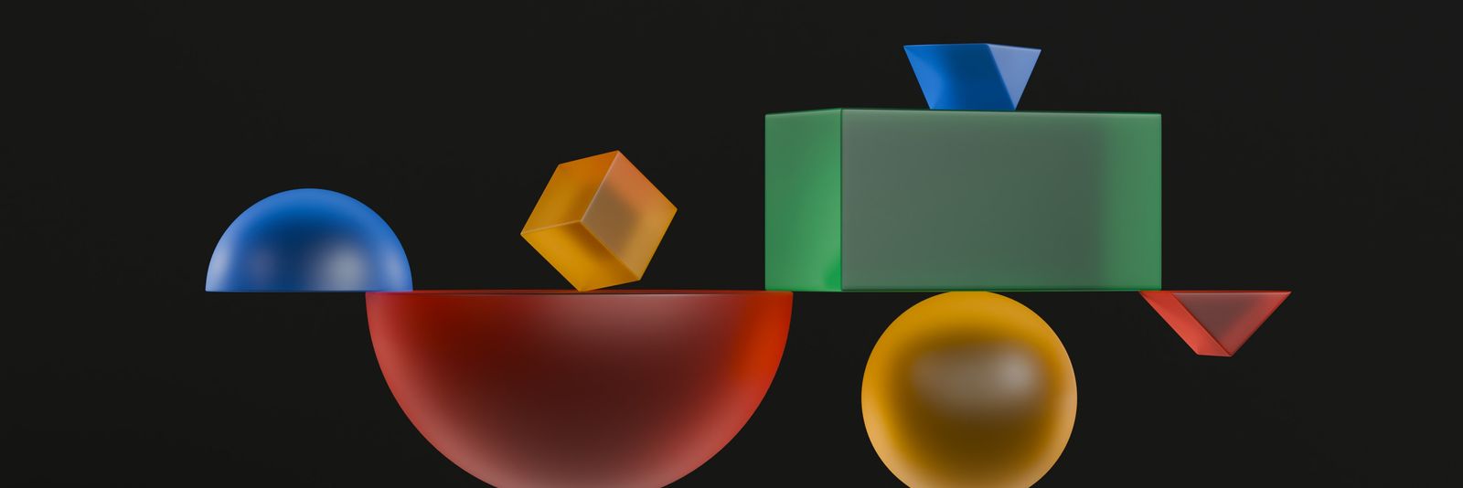 A computer screen with a black background and colorful shapes